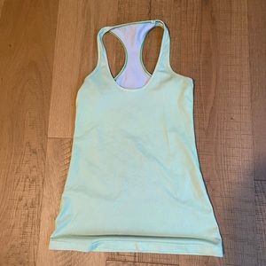 Lululemon cool racerback. Light yellow with purple polka dots. Size 4